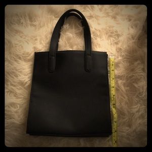 Sleek black Express purse
